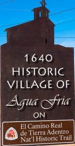 Welcome sign for The Traditional Village of Agua